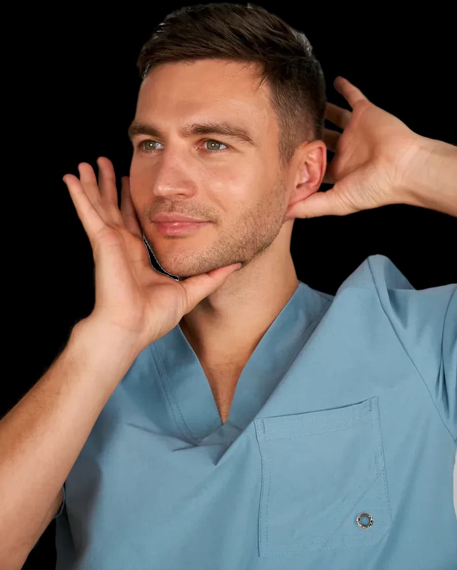 Dr. Ales Ulishchenko demonstrating a facial technique