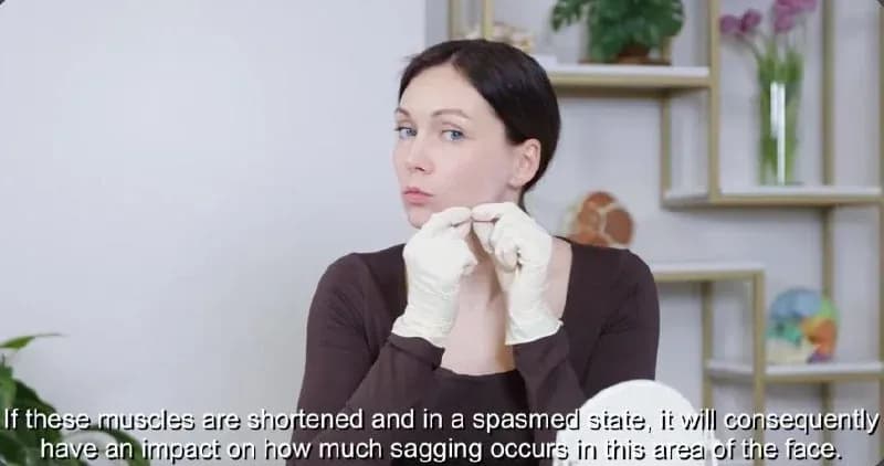 A frame from a real lesson, a trainer explaining facial muscle anatomy